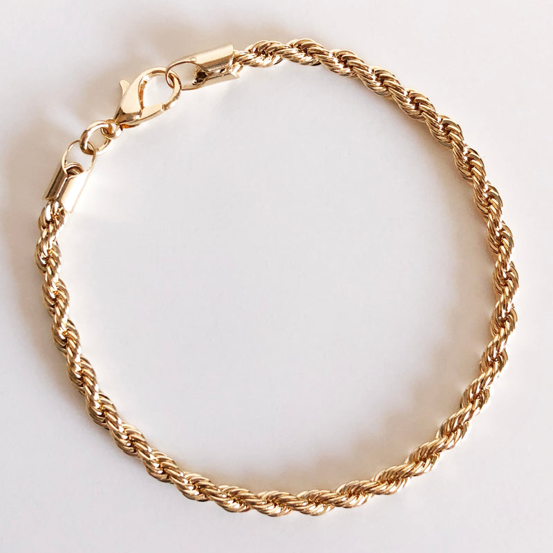 Gold rope chain bracelet flat lay display