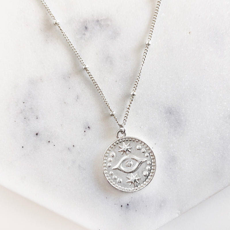 Sterling Silver Evil Eye coin necklace on satellite chain