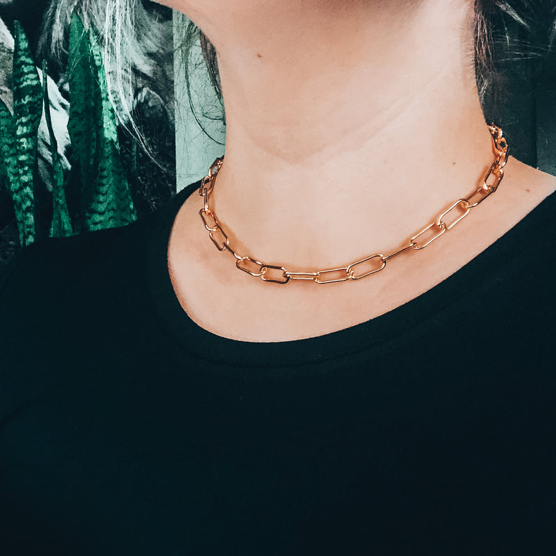 Model photo wearing 14K Gold-Filled thick link chain bracelet with extender