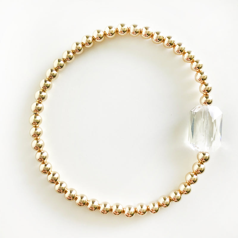14k Gold-Filled beaded bracelet with emerald Swarovski crystal in clear