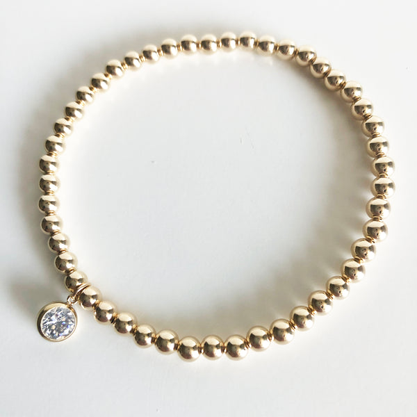 4mm 14K Gold-Filled Beaded Bracelet with a round Swarovski crystal charm