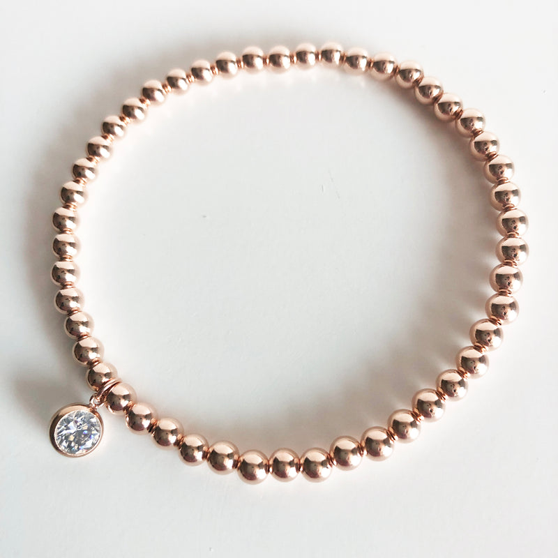 4mm 14K Rose Gold-Filled Beaded Bracelet with a round Swarovski crystal charm
