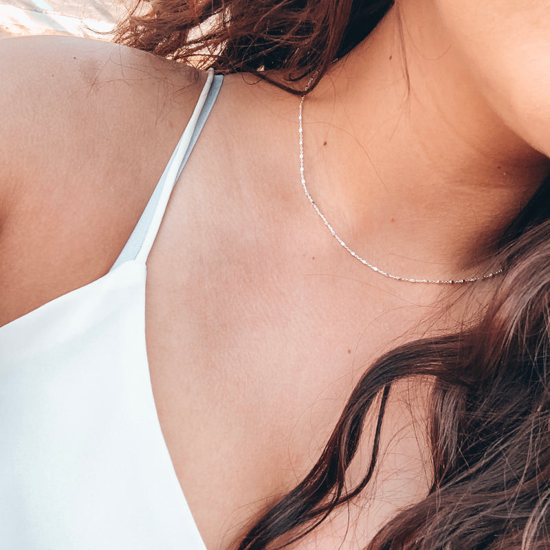 Model photo wearing Dainty sterling silver chain necklace sparkling