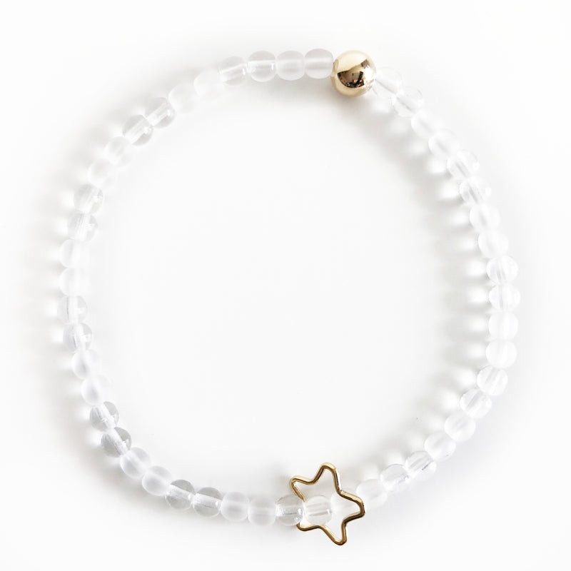 Czech glass beaded bracelet in clear with alternating gloss and matte beads with gold accent bead and star charm