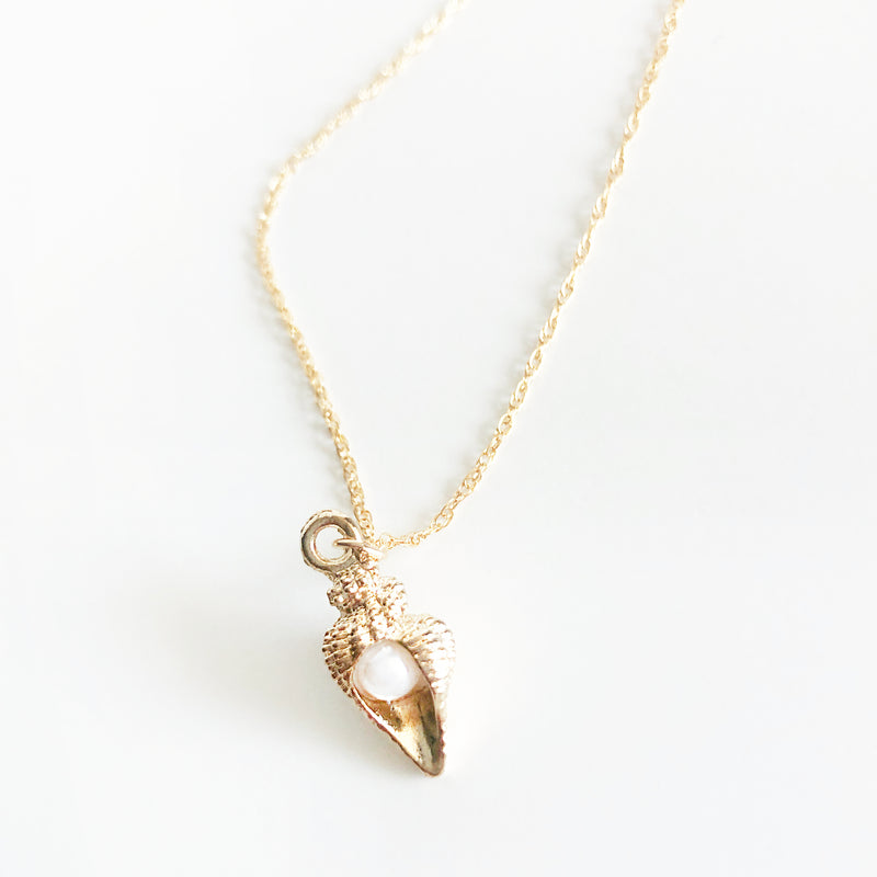 14k gold-filled chain necklace with conch shell charm with pearl in the middle