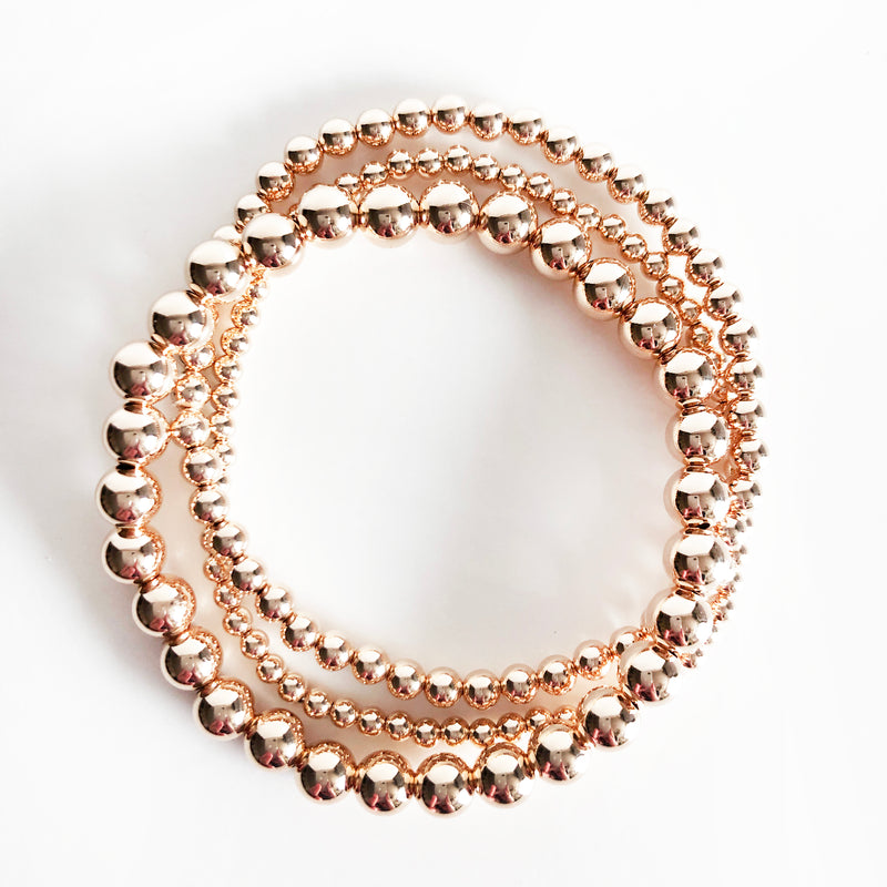 14k Rose gold-filled stack of beaded bracelets in 3mm, 4mm, and 6mm bead sizes